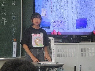 １６